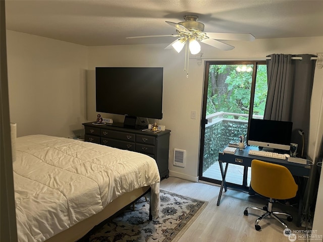 bedroom with access to outside, light hardwood / wood-style flooring, and ceiling fan