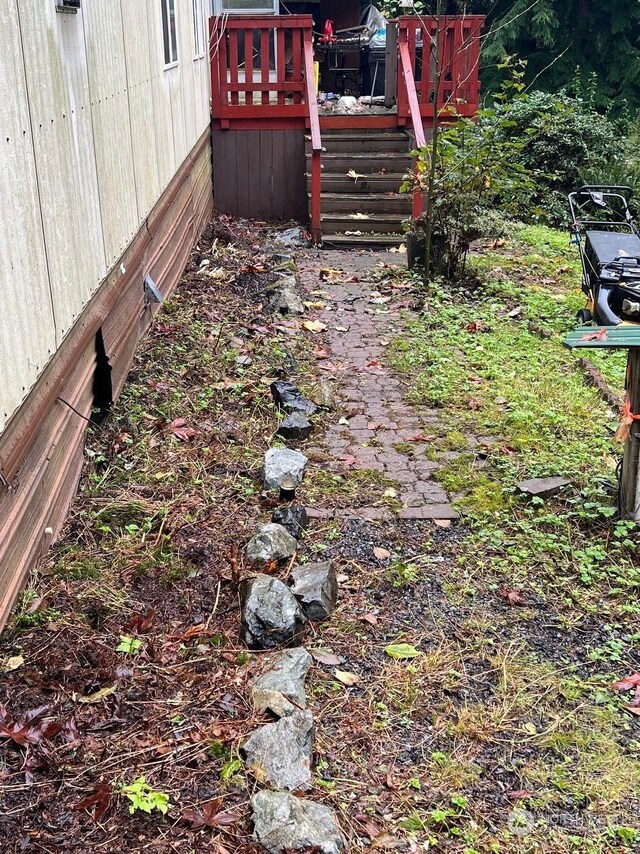 view of yard with a wooden deck