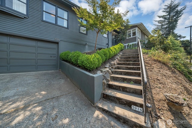 view of property exterior featuring a garage