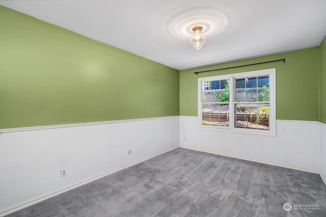 empty room with light colored carpet