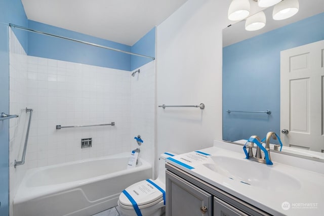 full bathroom with vanity, toilet, and shower / washtub combination