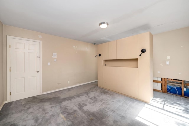 empty room with light colored carpet