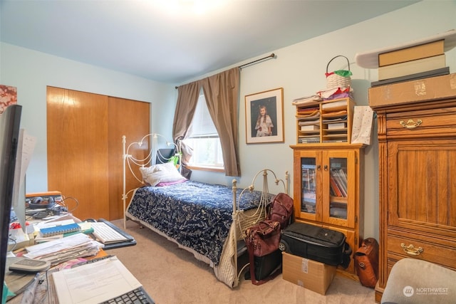 bedroom with light colored carpet