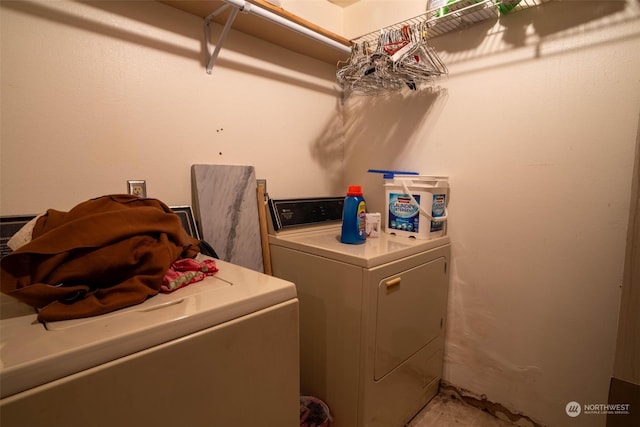 laundry room with washer and dryer