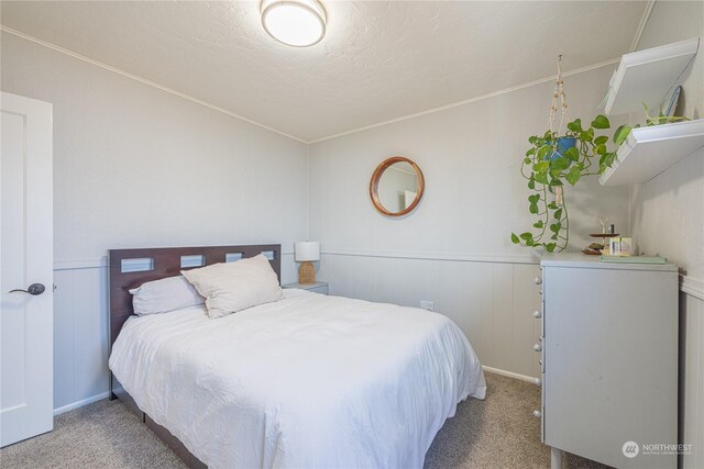 bedroom featuring carpet flooring and vaulted ceiling