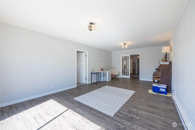 misc room with baseboard heating, french doors, and dark hardwood / wood-style flooring