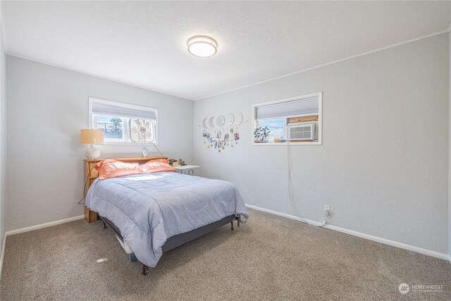 bedroom with carpet floors and cooling unit