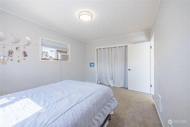 carpeted bedroom featuring cooling unit