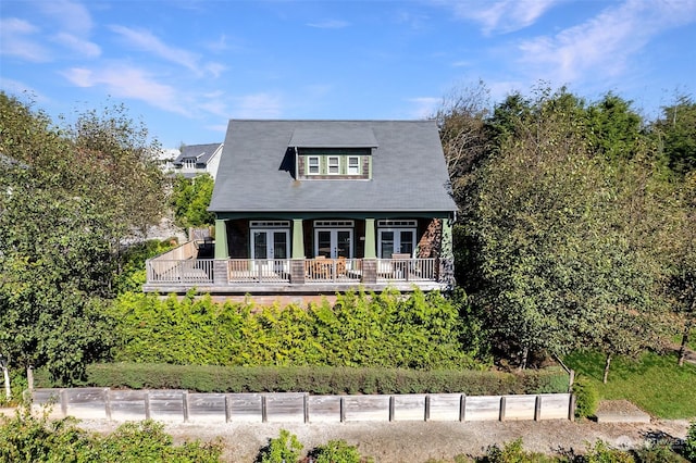 267 Compass St, Pacific Beach, WA 98571 - view of front of house featuring french doors