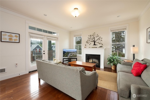 267 Compass St, Pacific Beach, WA 98571 - living room with a glass covered fireplace, french doors, crown molding, visible vents, and dark wood finished floors