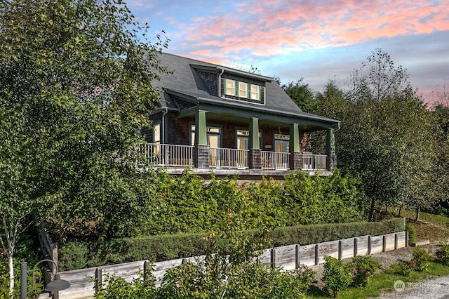267 Compass St, Pacific Beach, WA 98571 - bungalow featuring a porch and roof with shingles