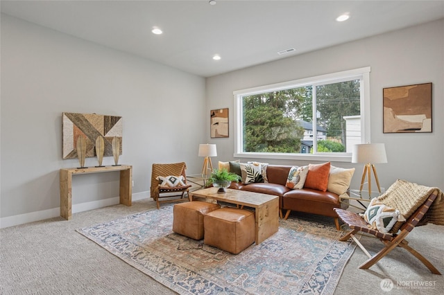 living room with recessed lighting, carpet, visible vents, and baseboards