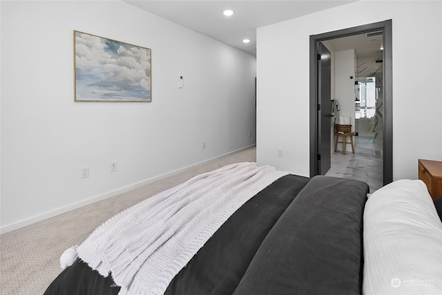 bedroom featuring light colored carpet