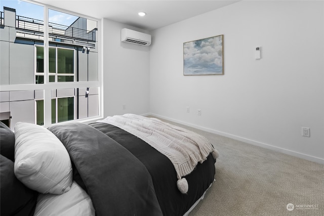 carpeted bedroom featuring a wall unit AC