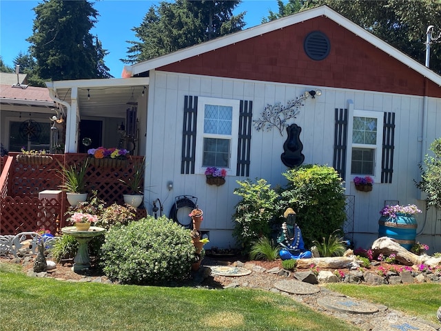 exterior space featuring a front lawn