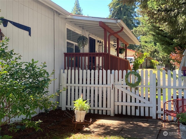 view of gate featuring fence