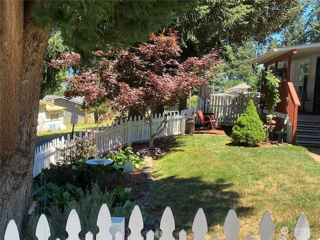 view of yard featuring a deck