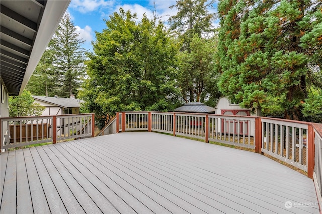 wooden deck featuring a gazebo