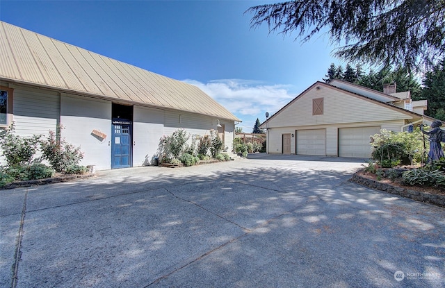 exterior space featuring a garage