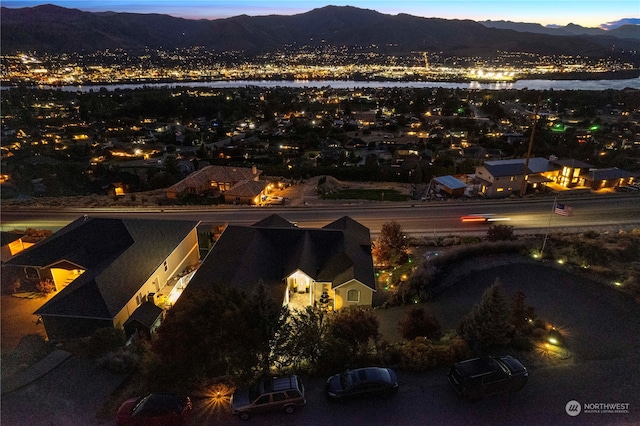 aerial view at dusk with a mountain view