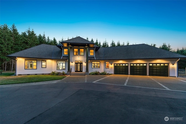 prairie-style home with a garage