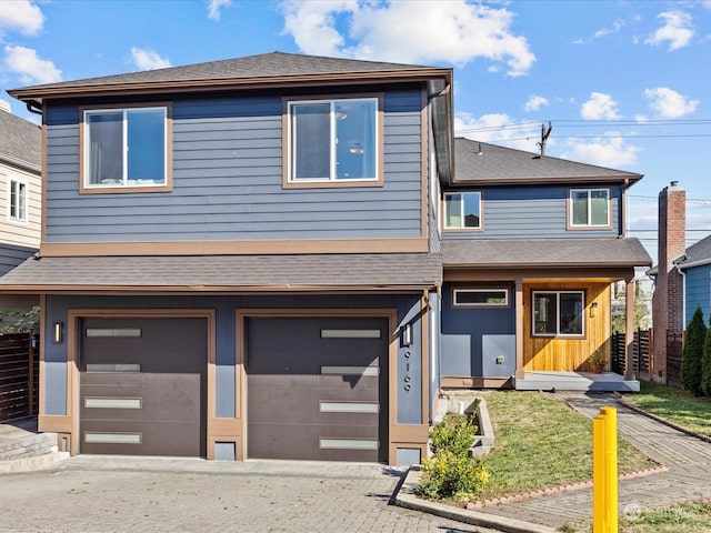 view of front of property with a garage