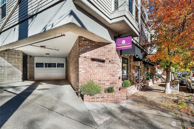 property entrance featuring a garage