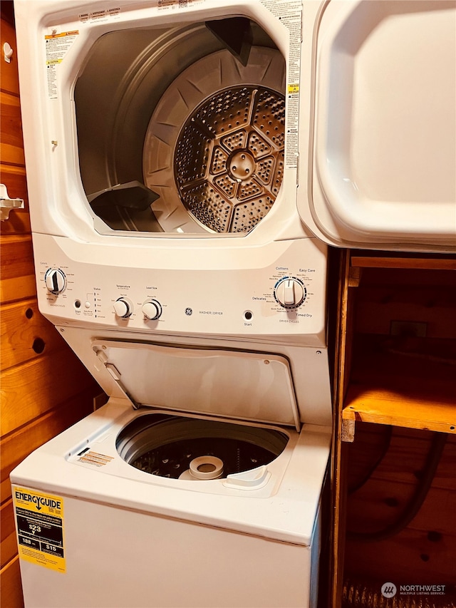 interior space with stacked washer and dryer