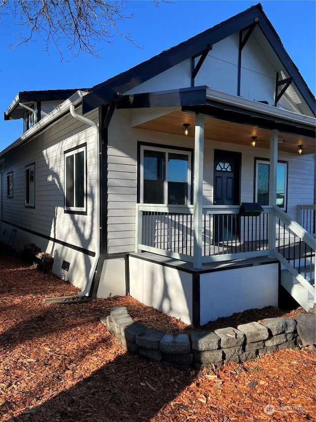 view of front of property featuring covered porch