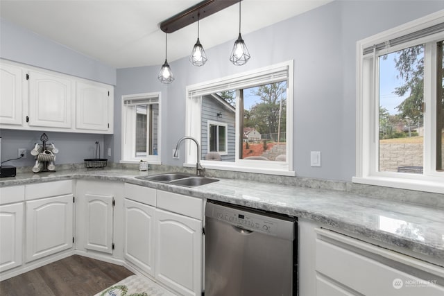 kitchen with dishwasher, sink, hanging light fixtures, dark hardwood / wood-style flooring, and white cabinets