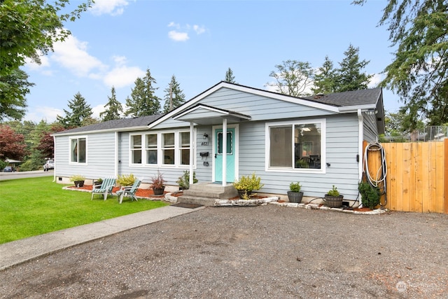 view of front of home with a front lawn