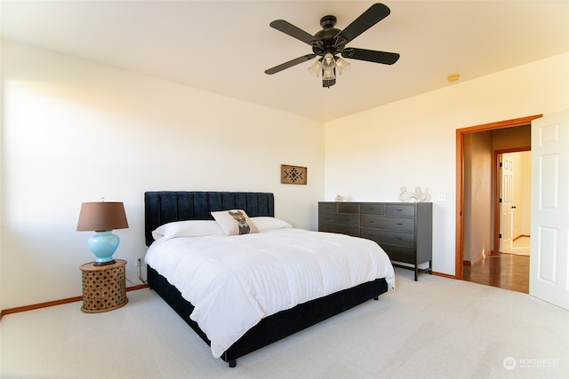 bedroom featuring ceiling fan and hardwood / wood-style flooring