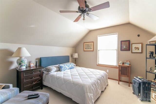 carpeted bedroom with lofted ceiling and ceiling fan