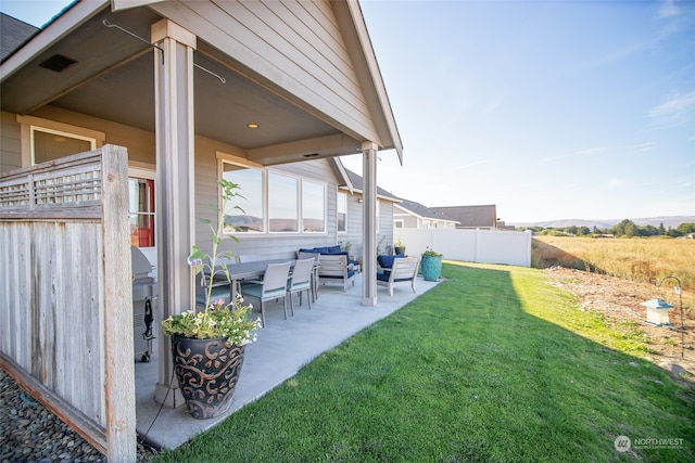 view of yard with a patio and outdoor lounge area