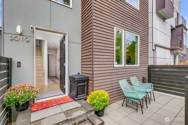 exterior space with a balcony and a patio