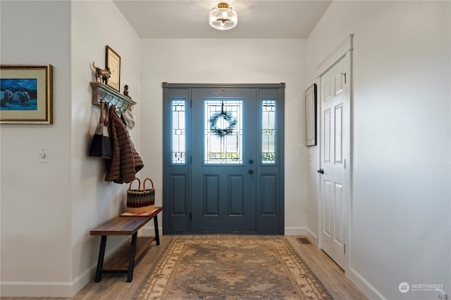 entryway featuring wood-type flooring