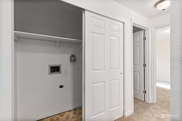 washroom with hookup for a washing machine and carpet floors