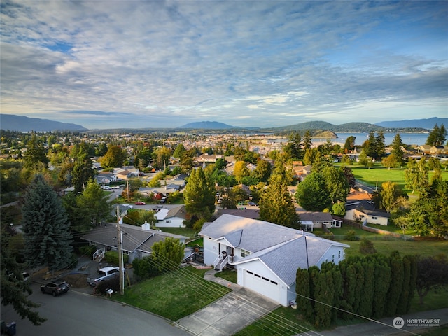 drone / aerial view featuring a mountain view