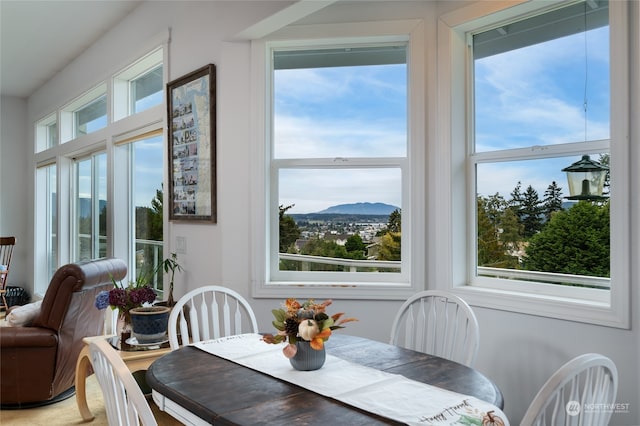 dining area featuring a mountain view