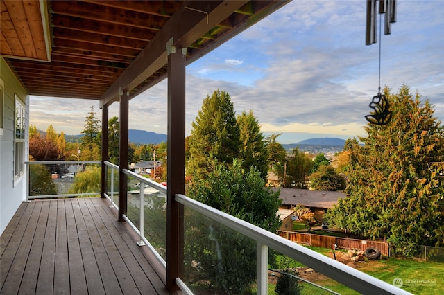 wooden deck featuring a mountain view