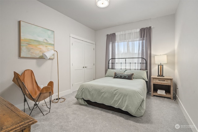 carpeted bedroom with a closet