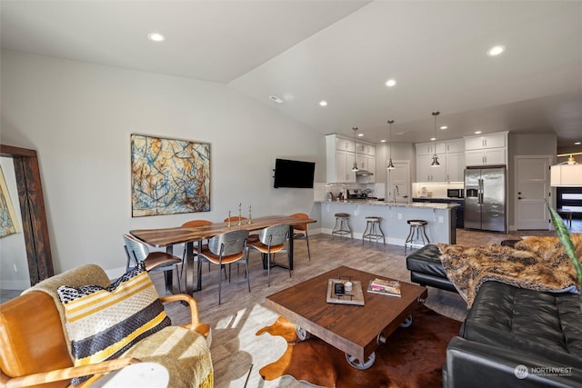 131 Sonoma Pl, Walla Walla, WA 99362 - living area featuring baseboards, vaulted ceiling, and recessed lighting