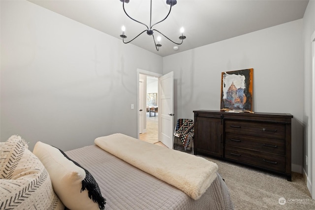 131 Sonoma Pl, Walla Walla, WA 99362 - bedroom featuring an inviting chandelier and light carpet