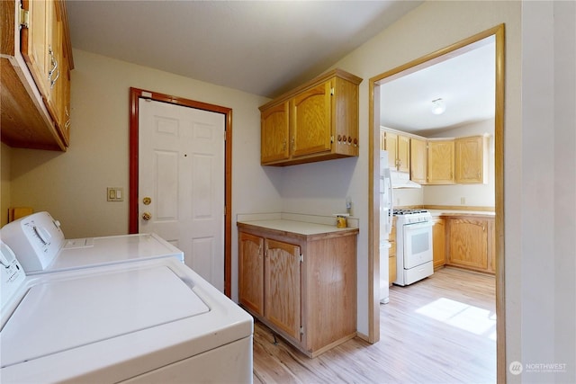1370 Samuel Dr, Walla Walla, WA 99362 - laundry area featuring washer and dryer and light wood-style floors