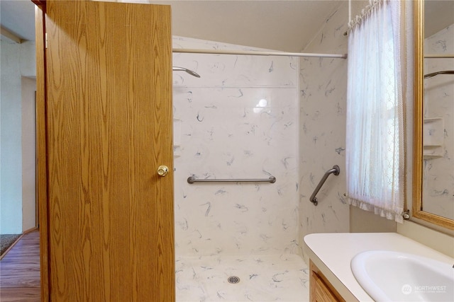 1370 Samuel Dr, Walla Walla, WA 99362 - full bath featuring vanity, a shower, and wood finished floors
