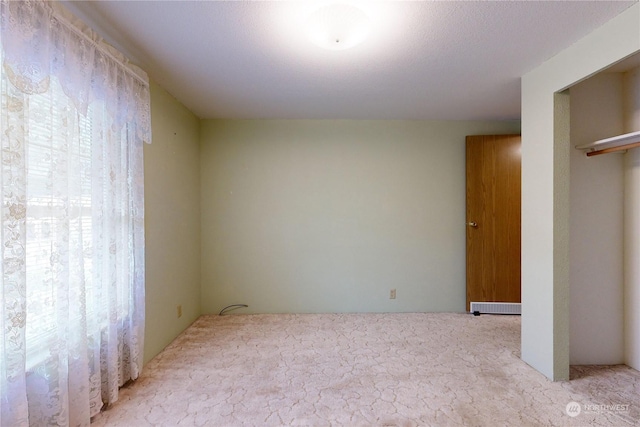 1370 Samuel Dr, Walla Walla, WA 99362 - unfurnished bedroom featuring multiple windows and carpet flooring