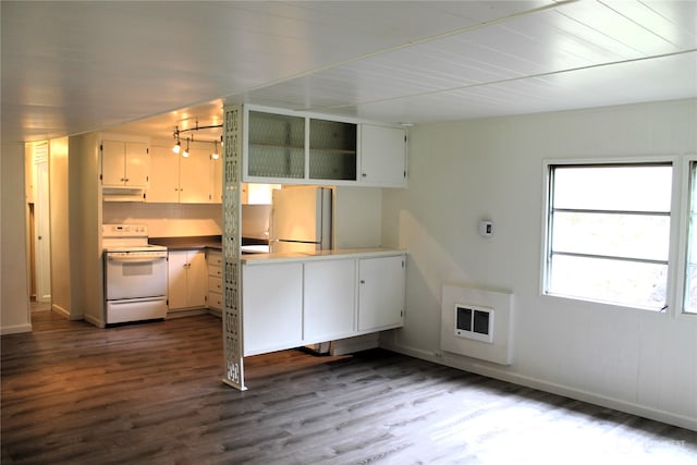 kitchen with white cabinetry, dark hardwood / wood-style floors, stainless steel refrigerator, and electric stove