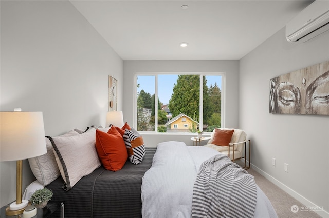 carpeted bedroom featuring a wall mounted AC