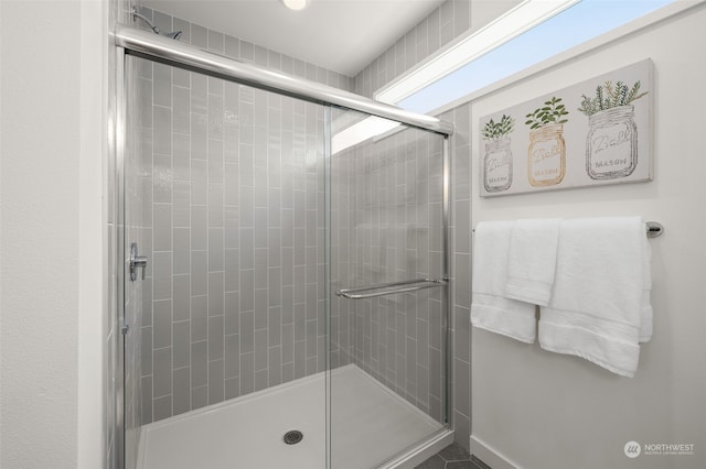 bathroom featuring walk in shower