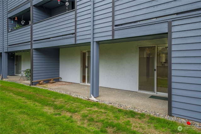 exterior space with a balcony and a patio area